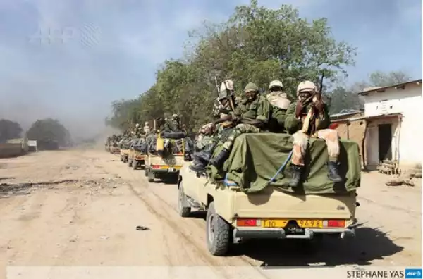 Chadian soldiers patrol Gambaru after capturing it from BH