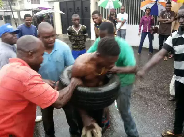 Photo: Car Thief Burnt By Angry Mob In Lagos