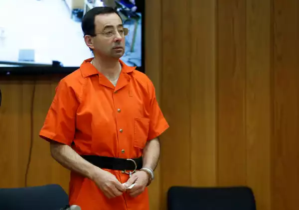 Former US gymnastics doctor, Larry Nassar, who s3xually assaulted top athletes is nearly killed in prison after being stabbed twice in the neck, twice in the back and six times in the chest