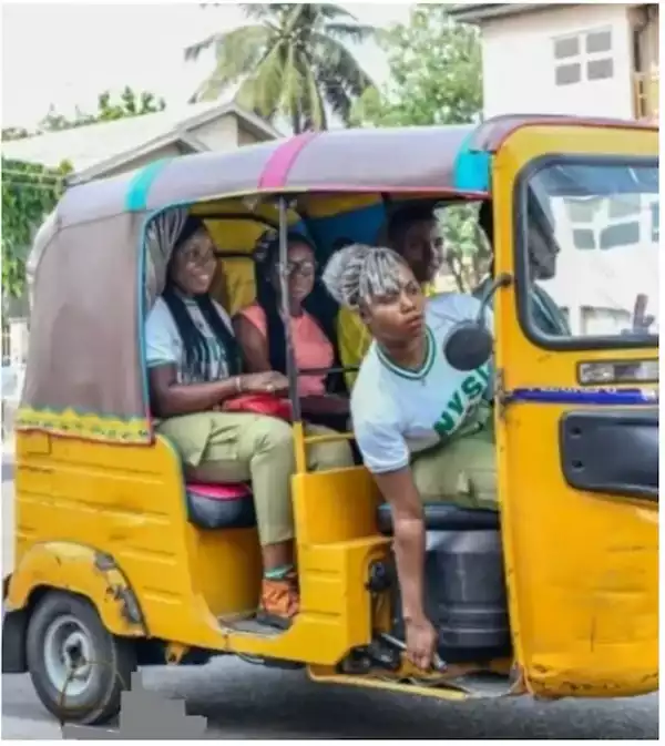 Lady hits the road with ‘Keke napep’ she purchased with NYSC allowance (Photos)