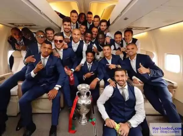 Photo: C. Ronaldo And Team-Mates Pose With The EURO 2016 Trophy Inside His Private Jet